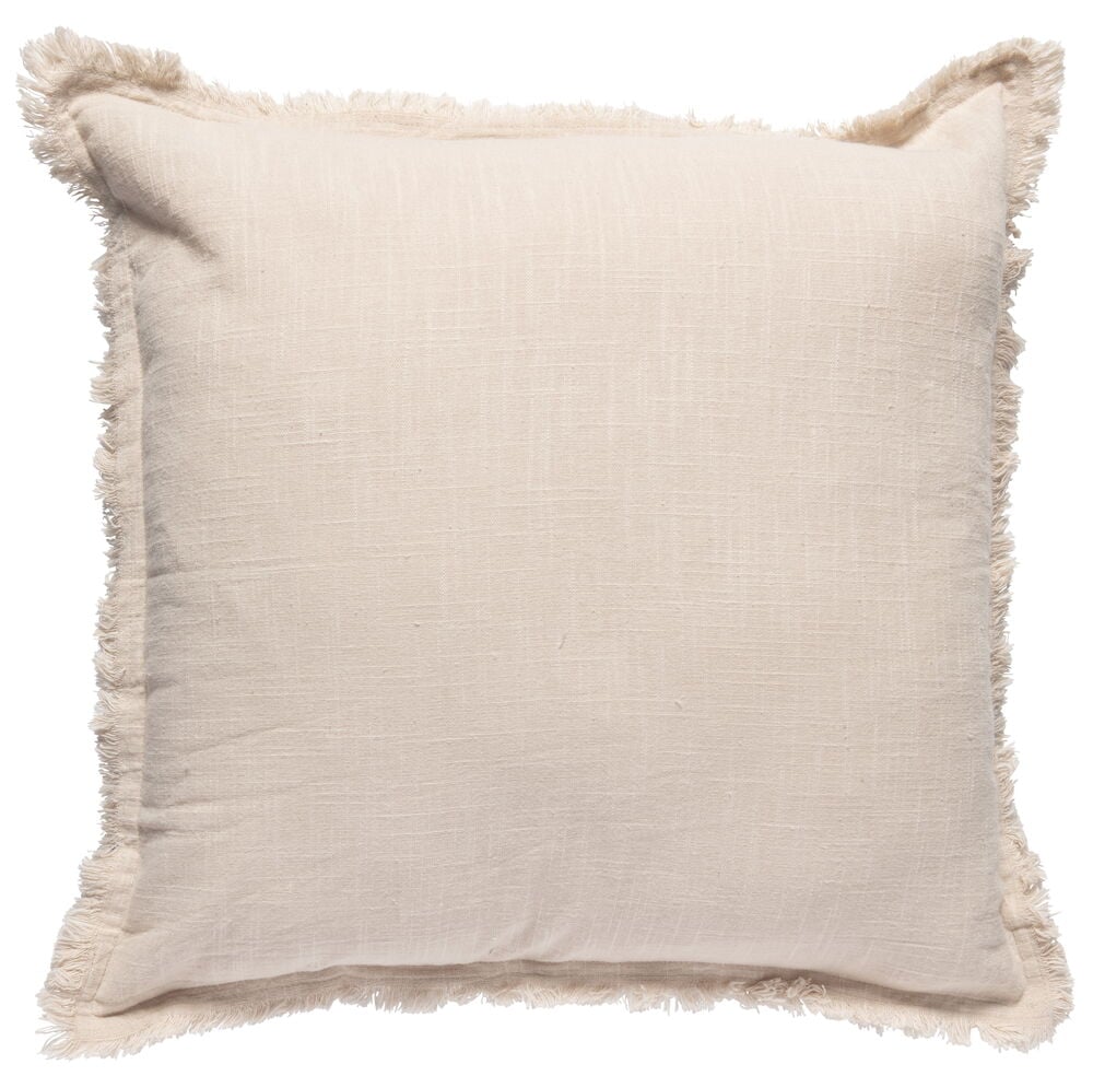 Beige kuddfodral i bomull med dekorativa fransar.