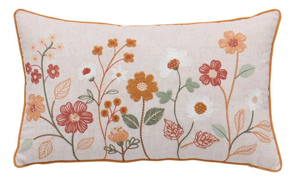 Pyntepute Florens Natur Polyester med broderte høstblomster og oransje passpoal.