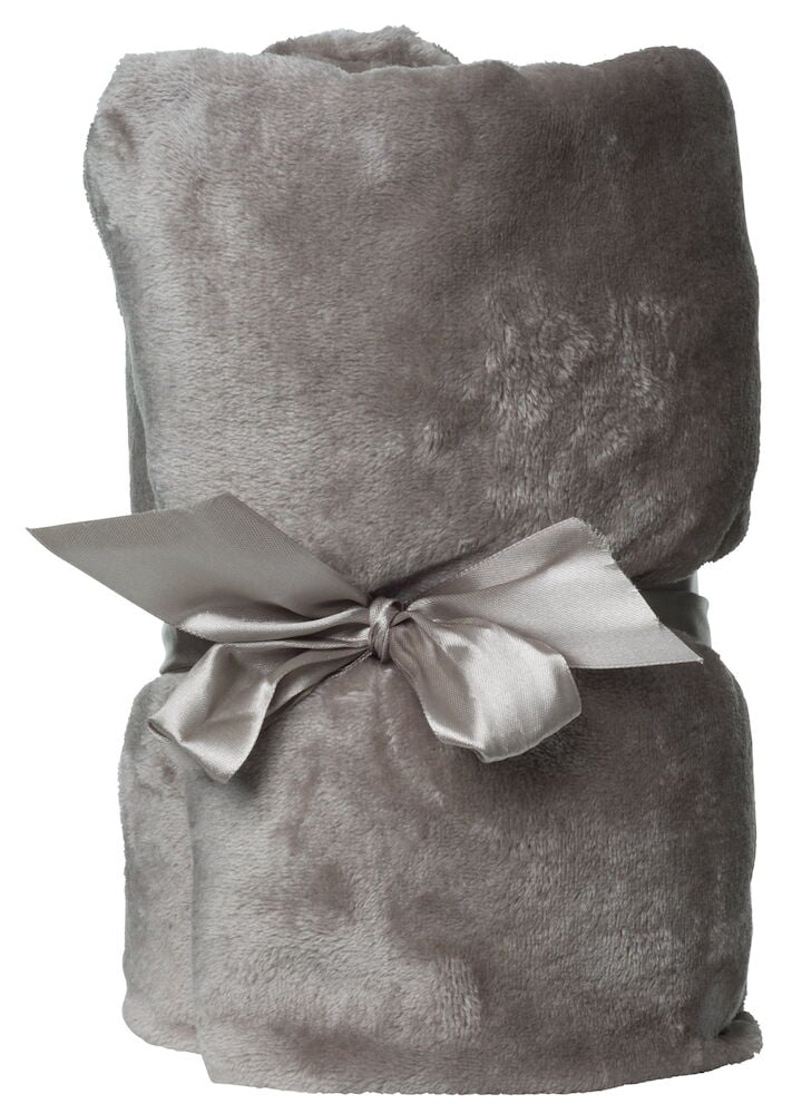 Tummanbeige pehmeä viltti rullattu silkkinauhalla.