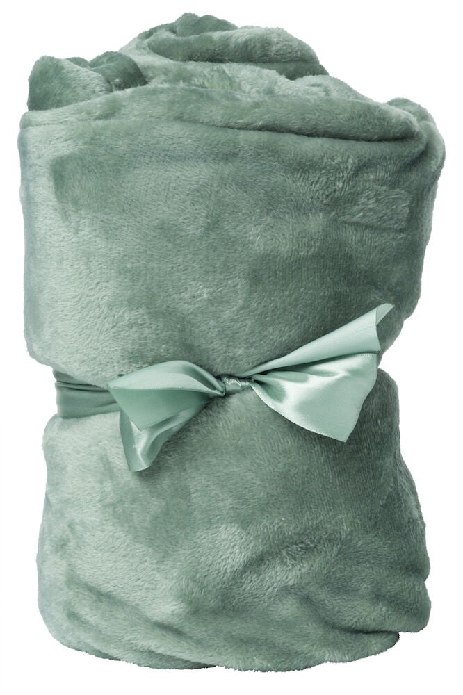 Mjuk grön pläd med rosett runt.