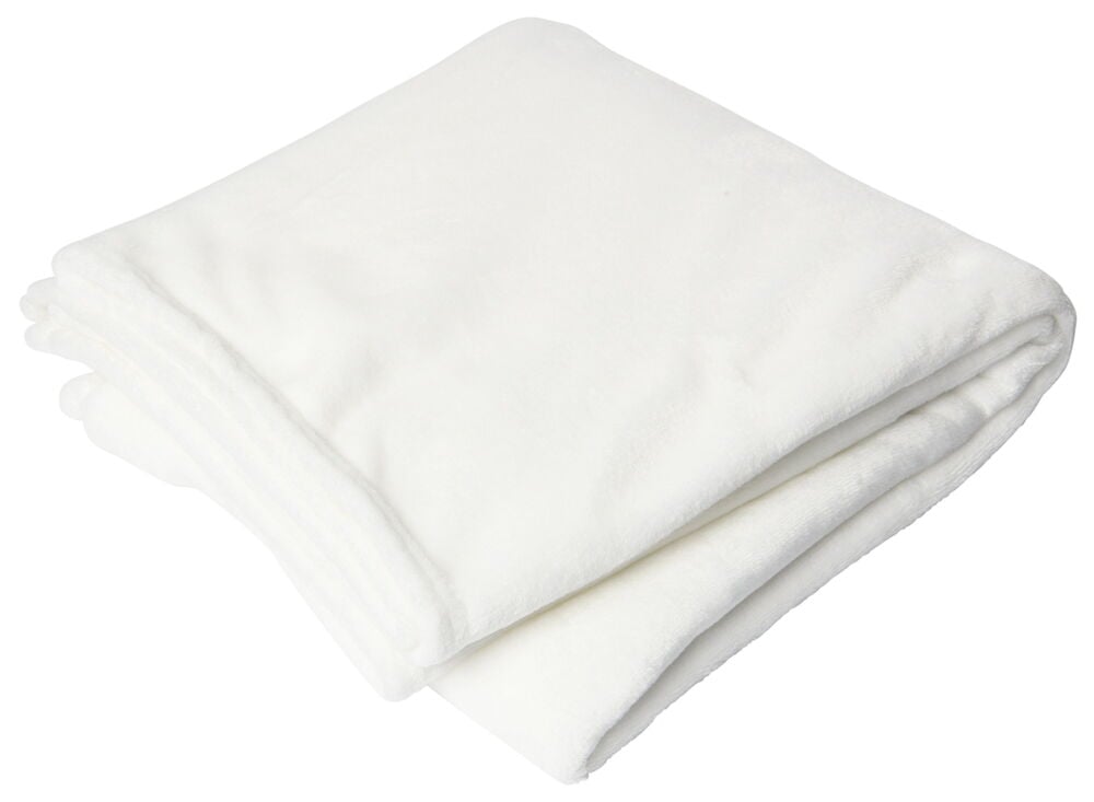 En vikt mjuk vit pläd i polyester.