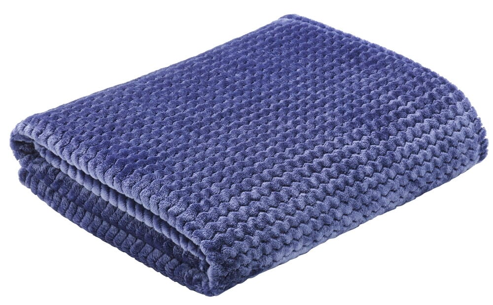 Vikt mörkblå pläd med stickad struktur.