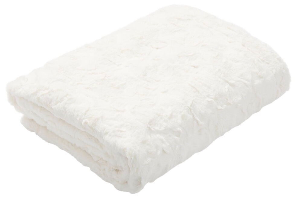 En vikt off-white pläd med mjuk fluffig yta.