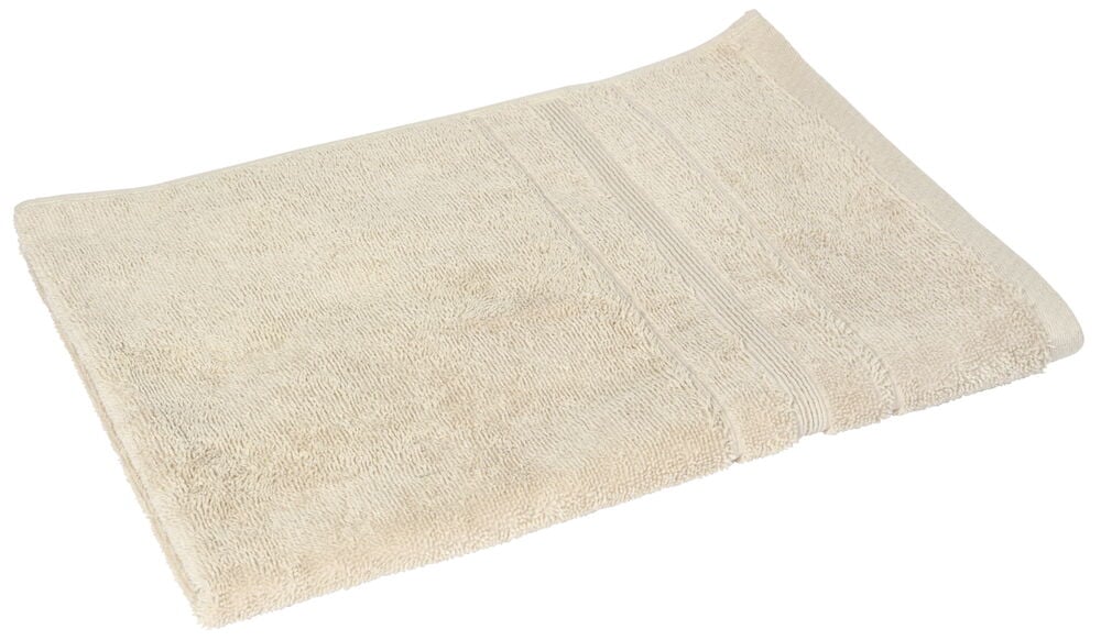 Vikt sandfärgad handduk i bomull med struktur.