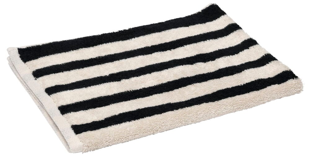 Vekt beige håndkle med svarte striper.