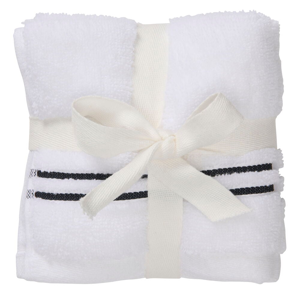 Vita tvättlappar i bomull med svarta ränder.