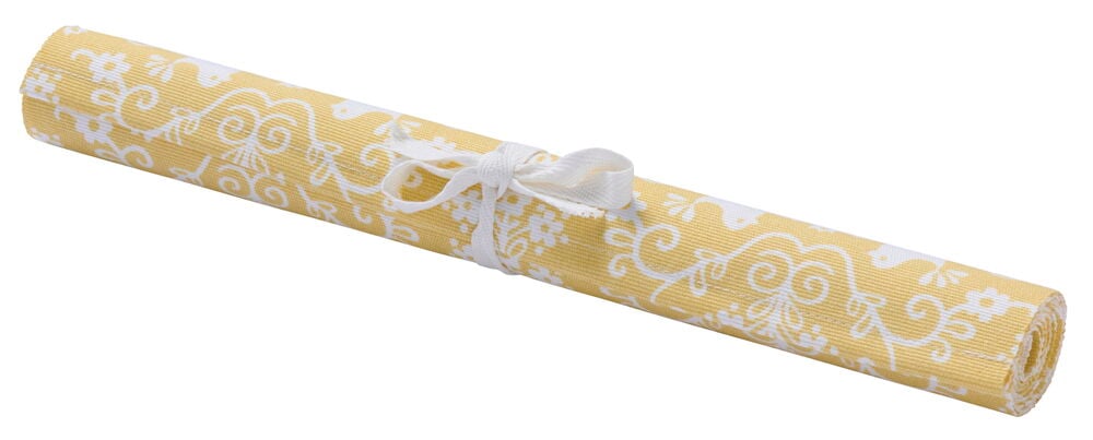 Gul bordsløper med hvitt fugle- og blad-mønster.