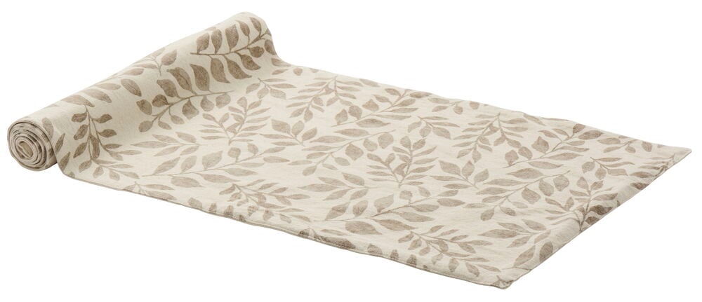 Beige pöytäliina, jossa lehtikuvio puuvillakankaalla.