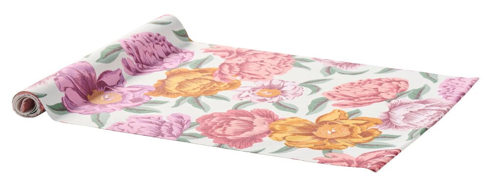 Vit bordslöpare Noomi i bomull/polyester med färgglatt blommönster, delvis upprullad.