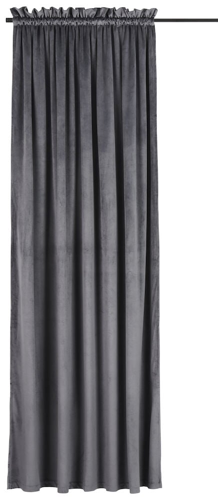Grå fløyelsgardin med rynkebånd på gardinstang.