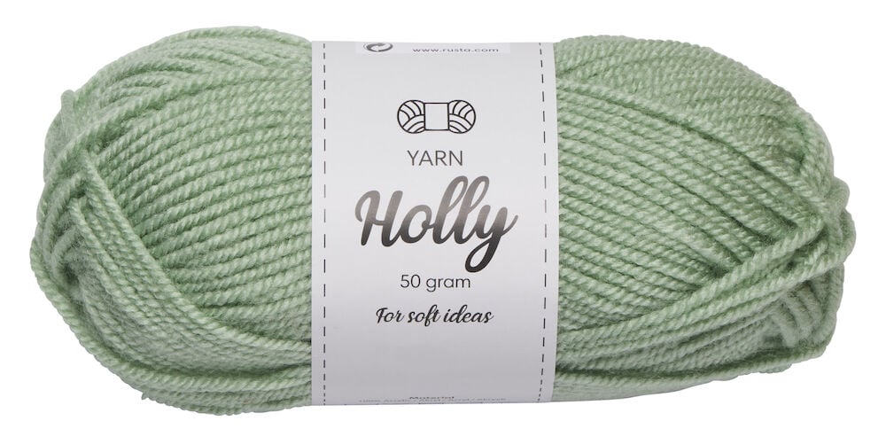 Grünes weiches Acrylgarn im Knäuel mit Etikett.