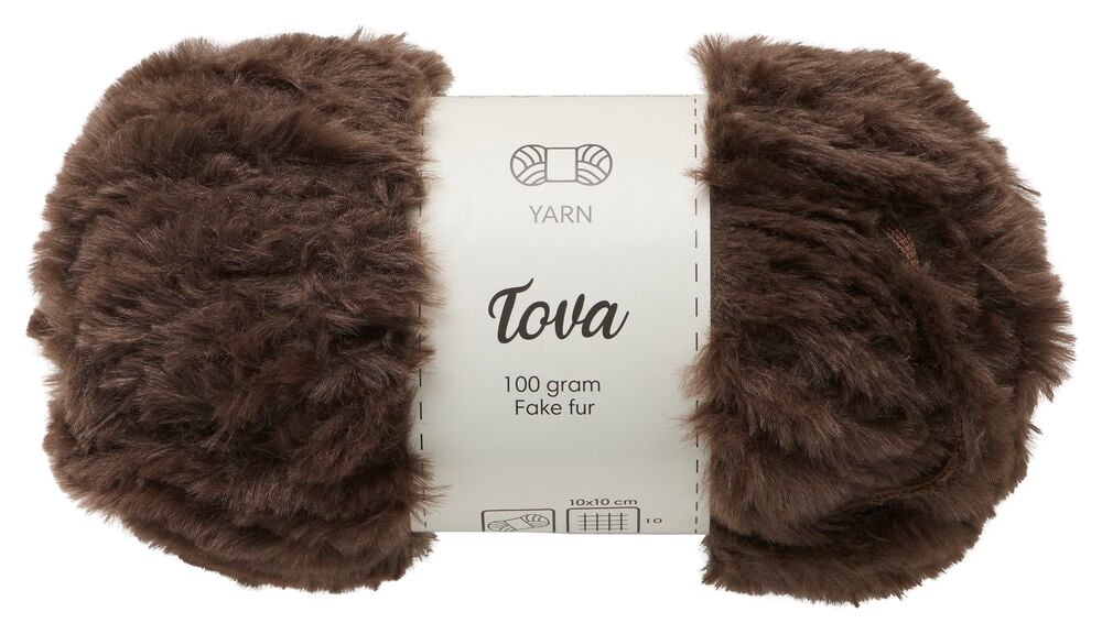 Braune Tova Kunstfellwolle, 100 Gramm, mit einem weißen Etikett mit Marke und Details.