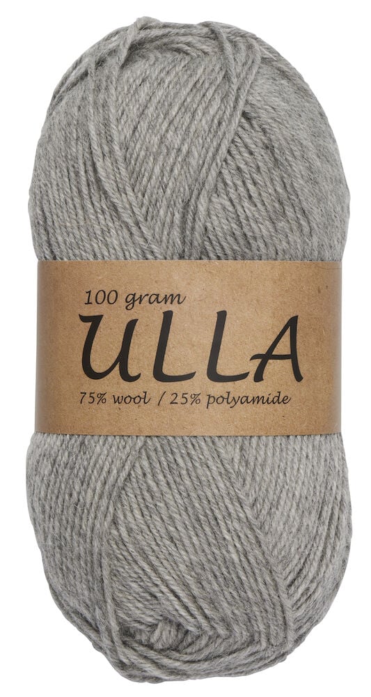 Ein Knäuel hellgraues Garn mit Papieretikett.