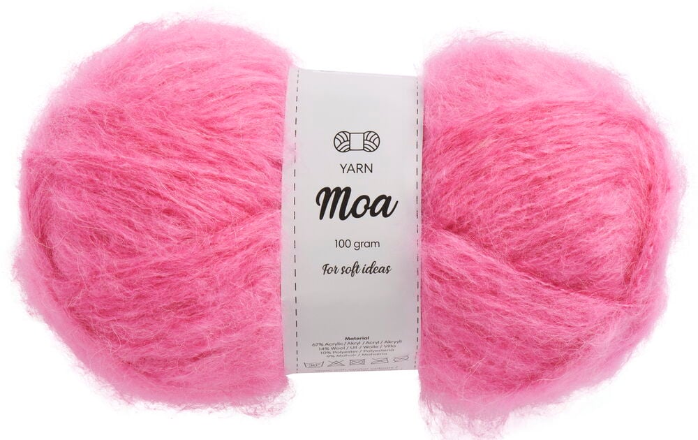 Knäuel hellrosa Mohairgarn mit weißem Papieretikett.