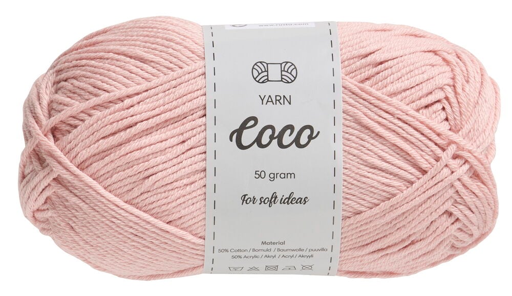 Ein Knäuel rosa Garn mit einem weißen Papieretikett.