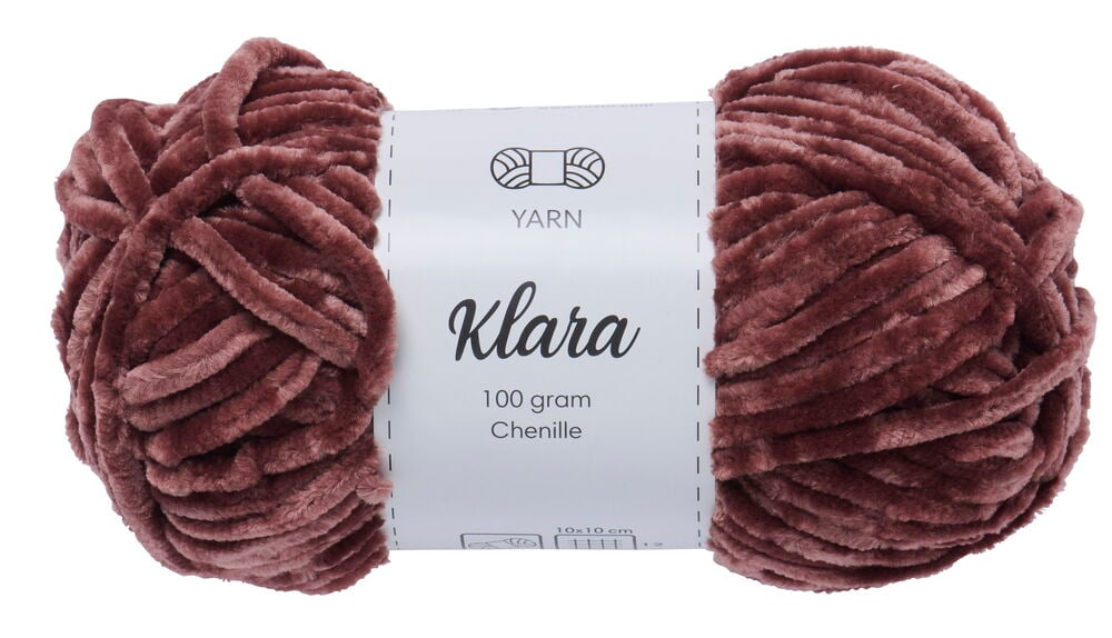 Brun chenillegarnnystan med vit etikett.