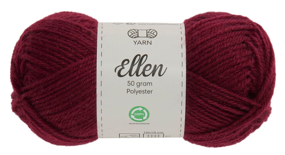 Dunkelrotes Garnknäuel mit weißem Etikett.