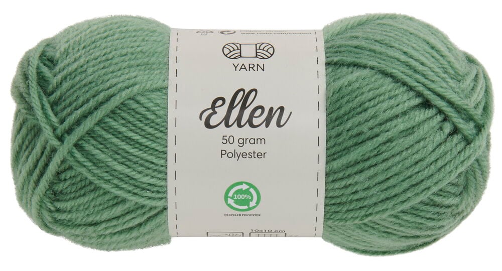 Ein grünes Knäuel Garn mit weißem Etikett.