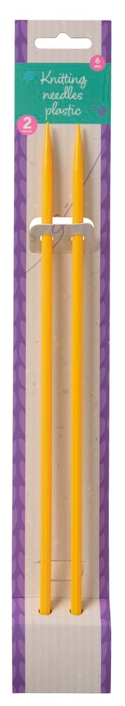 Två gula stickor av plast i förpackning.