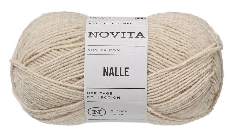 Beige lankakerä valkoisella tuotetarralla.