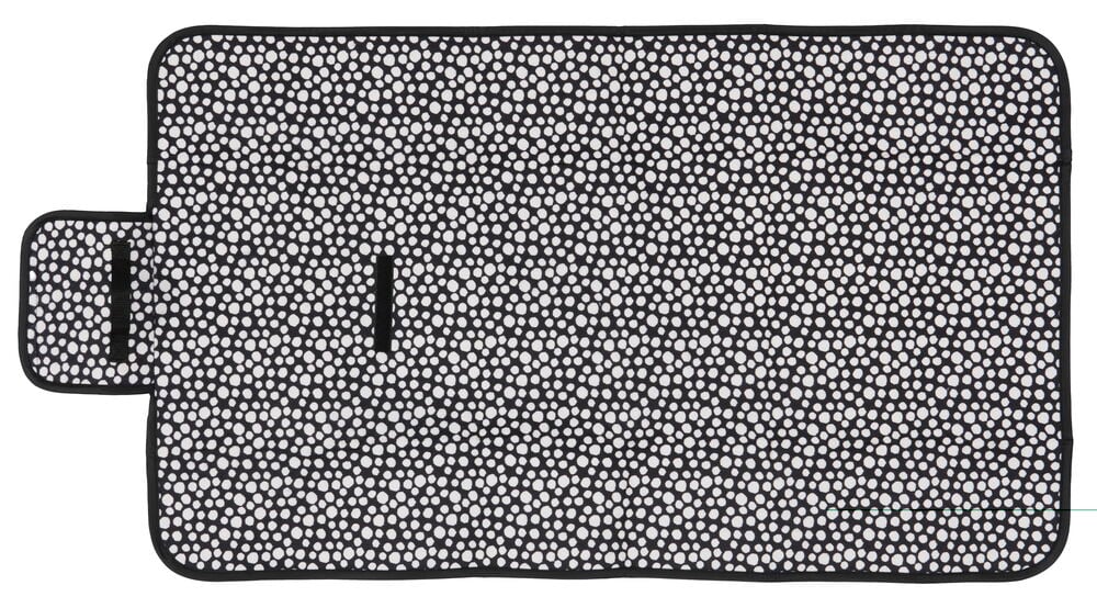 Svart piknikpledd med hvite prikker og håndtak.