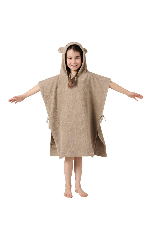 Lapsi beigessä hupullisessa kylpyviitassa, jossa on korvat.