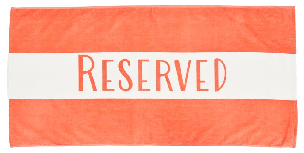 Strandhåndkle med oransje og hvit stripe.