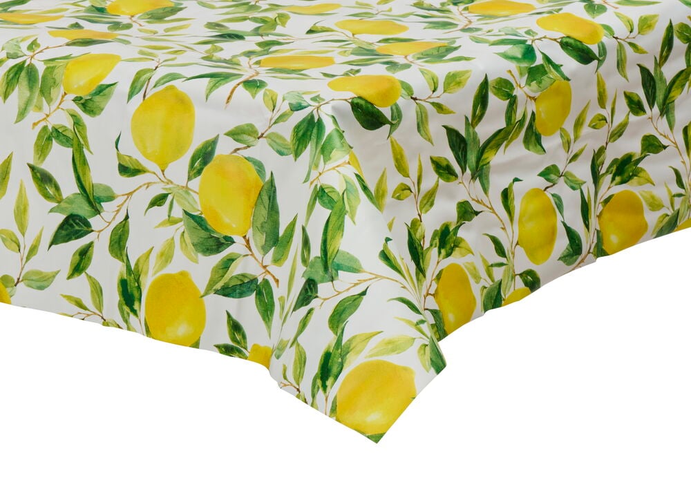 Voksduk med sitronmønster på hvit bakgrunn.