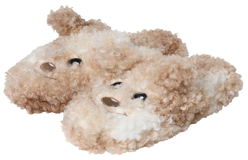 Beige Teddy-Pantoffeln in Form eines Tiergesichts.