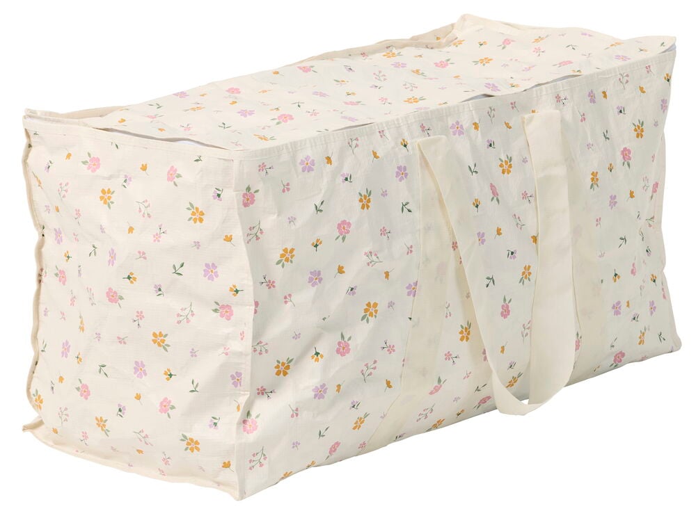 Luonnonvalkoinen kukkakuvioinen taitettava kassi 80x39x35 cm Kukat, jossa pinkkejä, oransseja, violetteja kukkia, vetoketju ja kaksi kahvaa.
