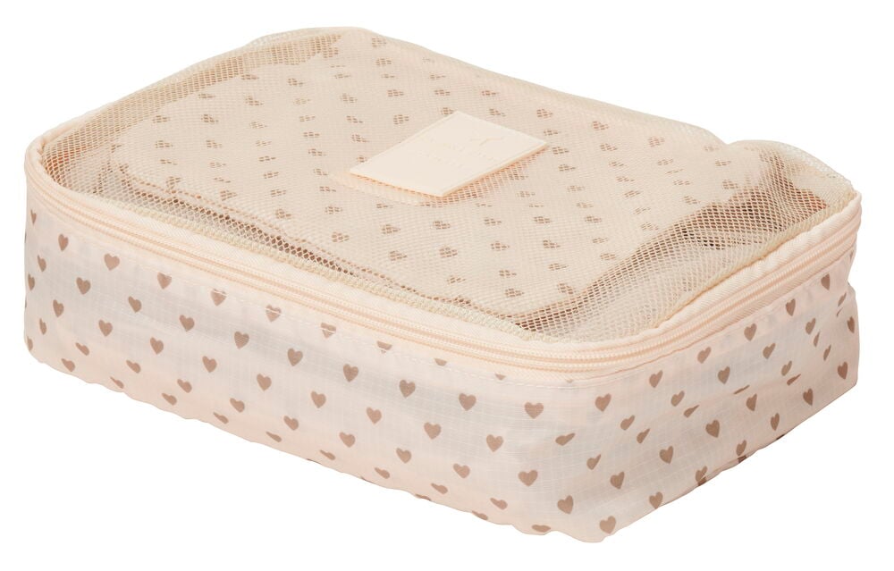 Lys pakke-kube med hjertemønster og nettinglokk.
