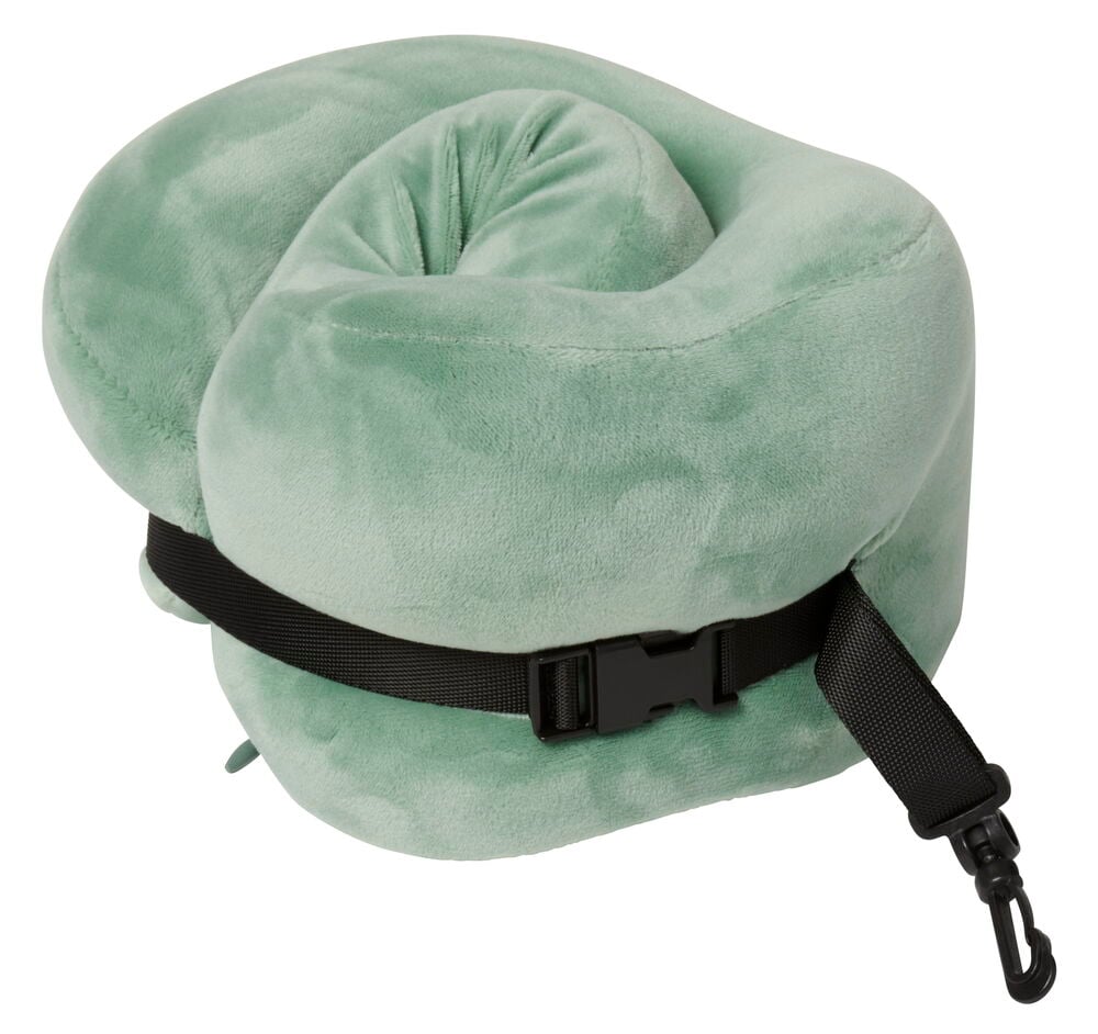 Grön nackkudde i velour med rem och spänne.