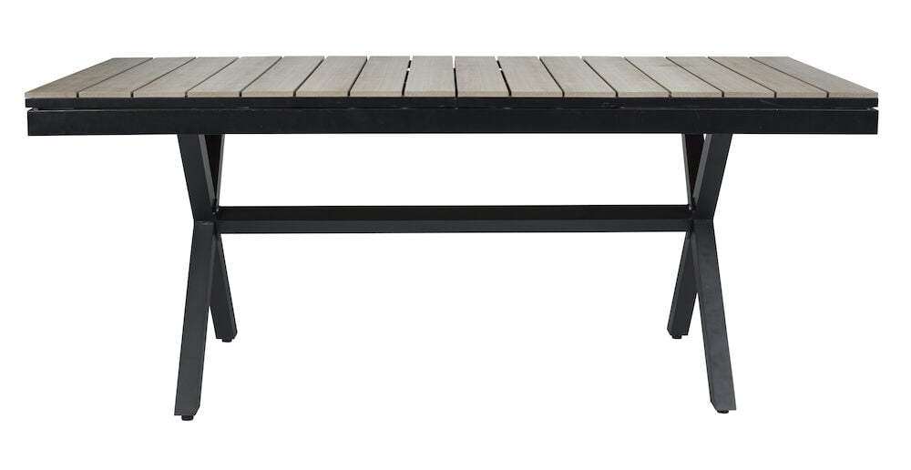 Svart uttrekkbart spisebord med rillet bordplate.