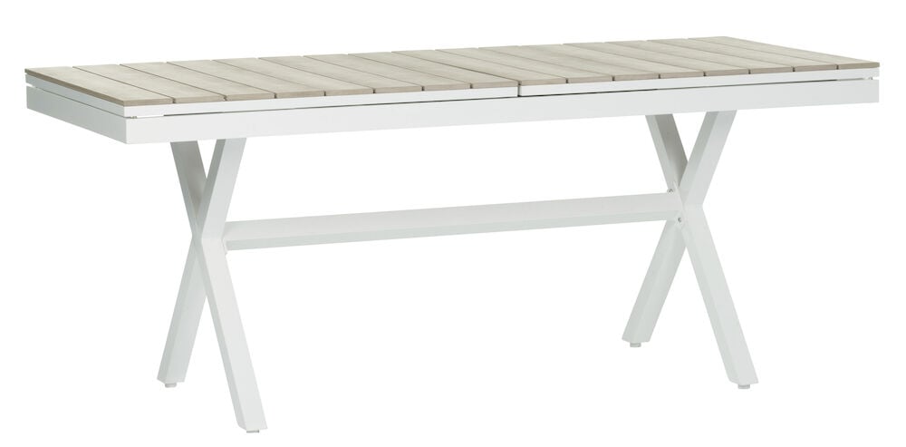 Valkoinen jatkettava pöytä puukuvioidulla pöytälevyllä.