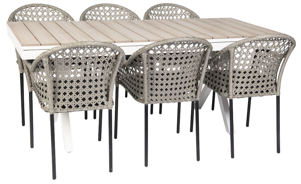 Laajennettava valkoinen pöytä, jossa kuusi punottua tuolia.