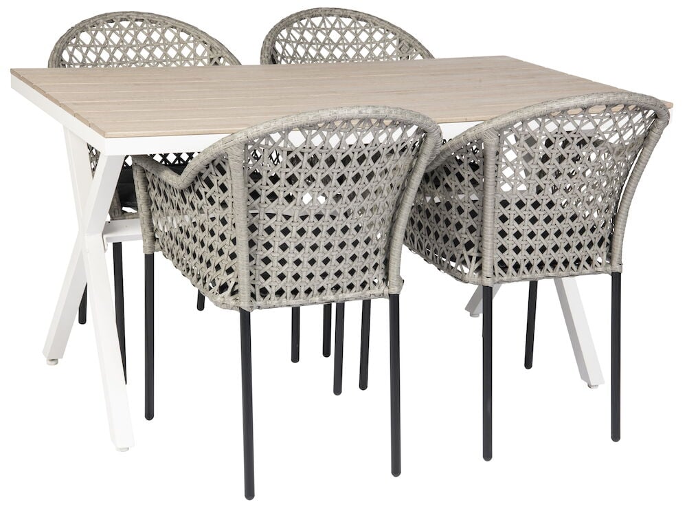 Suorakulmainen valkoinen pöytä neljällä punotulla tuolilla.