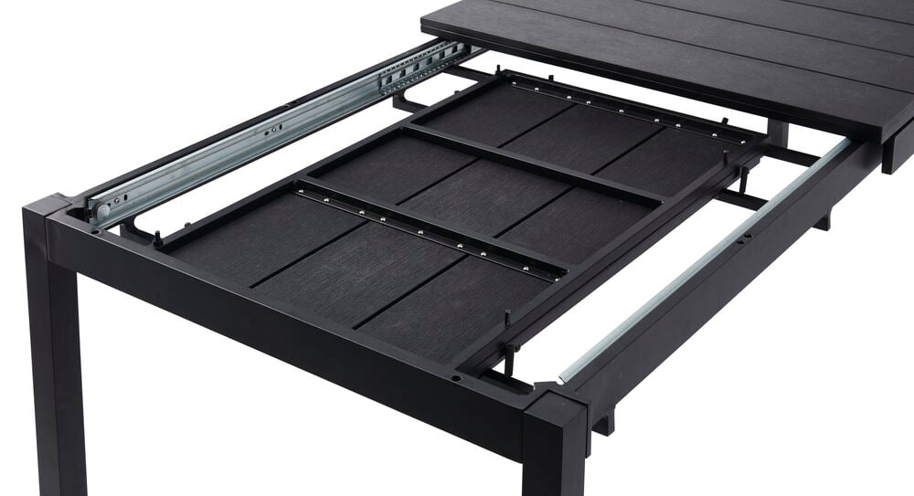 Mustavalaistettava pöytä näkyvällä jatkolevyllä.