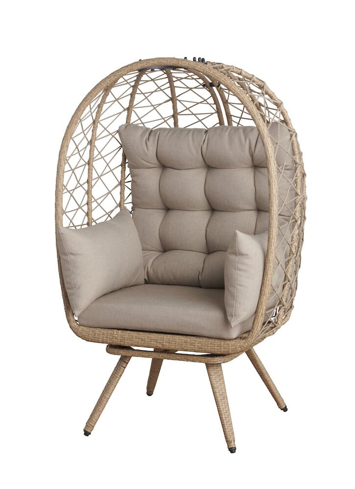 Beige tekorottinkituoli selkänojatyynyllä ja käsinojilla.