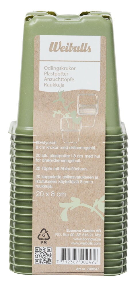 Grüne quadratische Plastiktöpfe in einem Paket gestapelt.