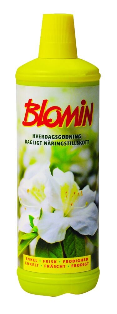Gul flaska med Näringstillskott Blomin 1 liter Inom- och utomhusbruk, med vita blommor på etiketten.