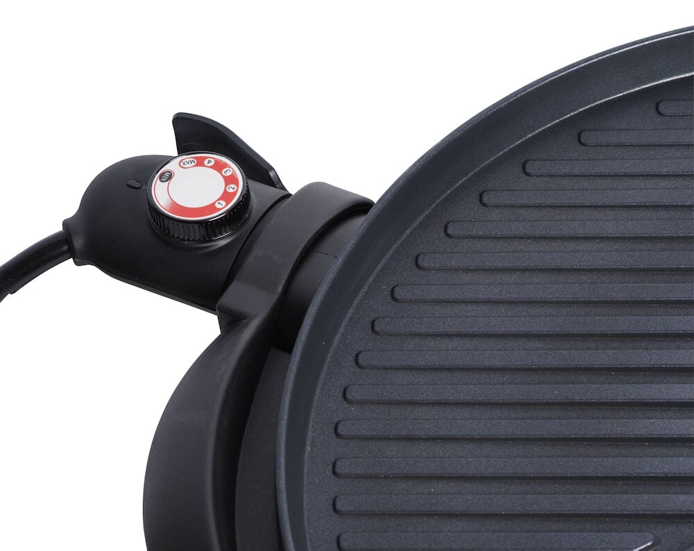 Rund elgrill med termostat och räfflad grillyta.