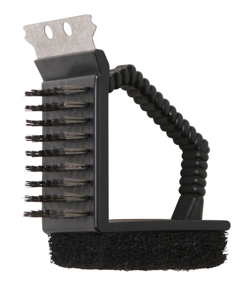 Grilliharja messinkiharjaksilla, kaavin ja musta sieni.