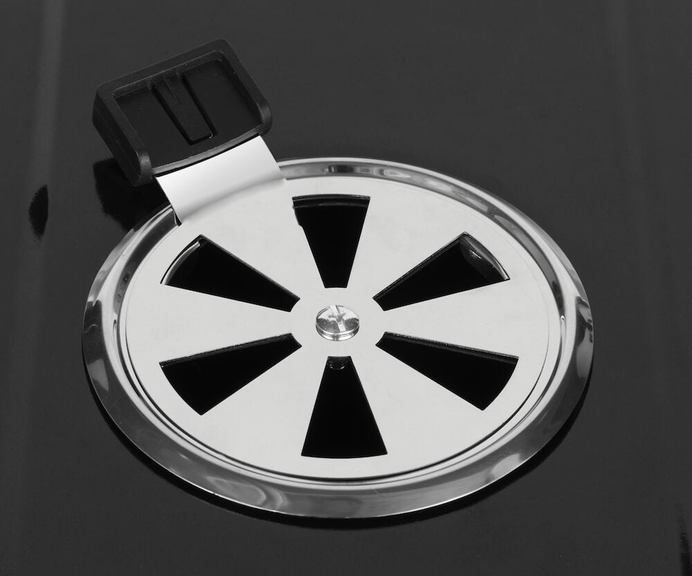 Ventil i rustfritt stål på grillokk.