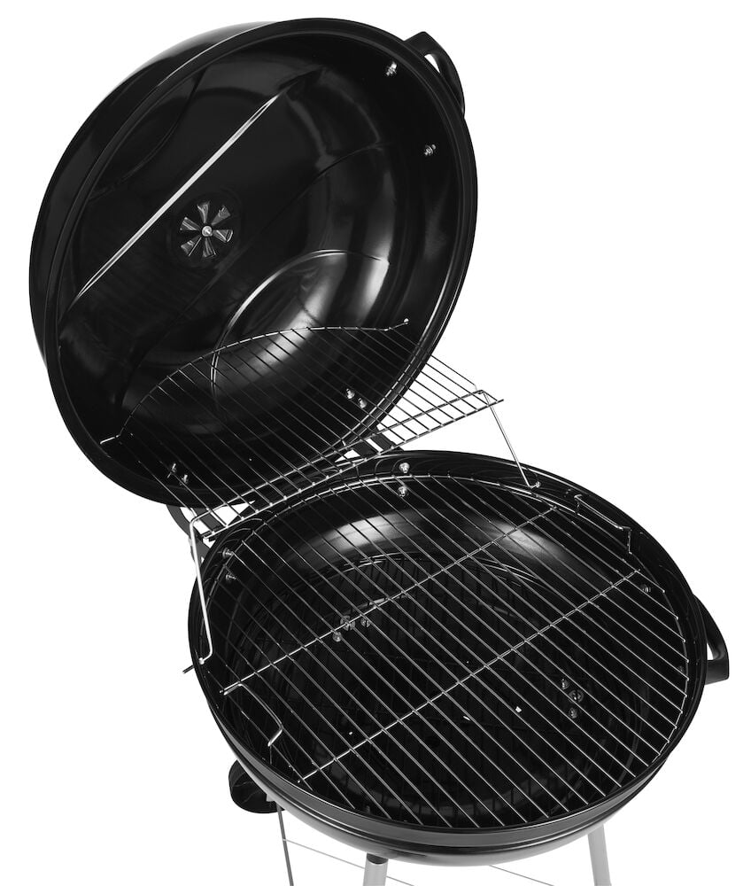 Åpen rund kullgrill med sideåpnet lokk og grillrist.