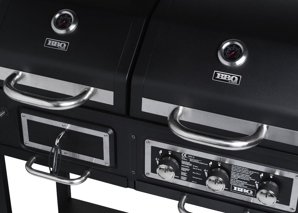Svart kombinerad gasol och kolgrill med dubbla lock.