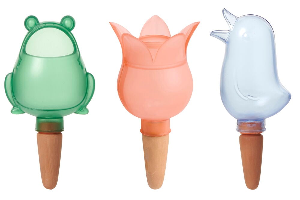 Grüne Selbstbewässerungsfigur mit Terrakottaeinsatz und Nachfüllverschluss.