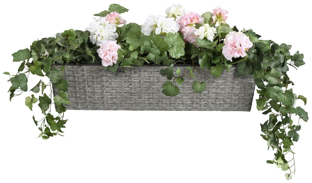 Harmaa muovilaatikko, jossa on vaaleanpunaisia ja valkoisia kukkia.