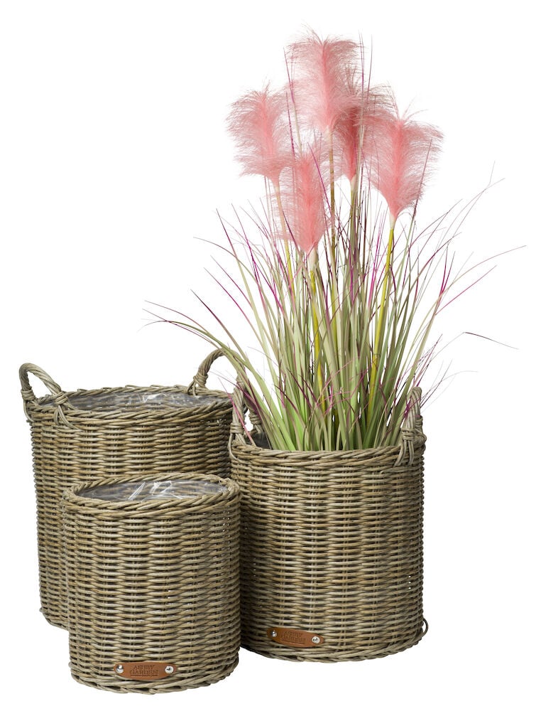 Drei braune Töpfe mit rosa Ziergras.