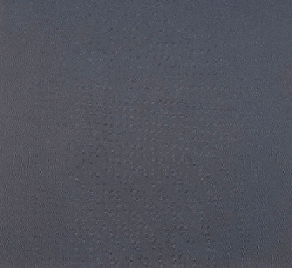 Närbild av grått akryltyg för terrassmarkis.