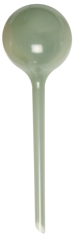 Eine grüne Bewässerungskugel aus transparentem Kunststoff.